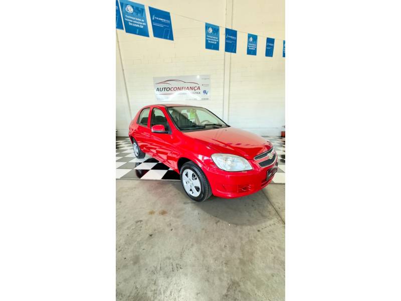 CHEVROLET - PRISMA - 2012/2012 - Vermelha - R$ 33.900,00